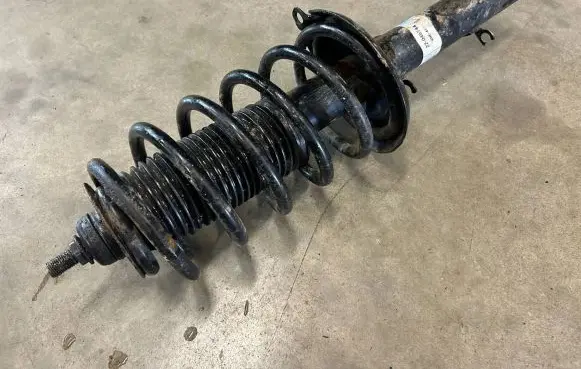 Volkswagen Golf IV Front shock absorber with coil spring 22045744