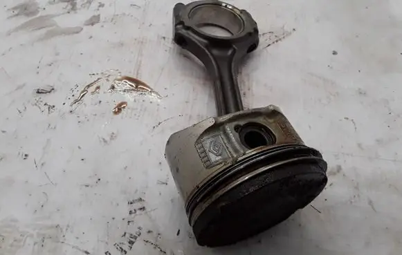 Piston with connecting rod