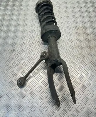 Volkswagen Touareg II Front shock absorber with coil spring 7P0412295C