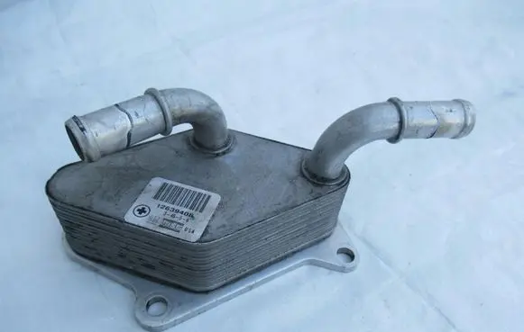 Opel Astra J Engine oil radiator 12639408