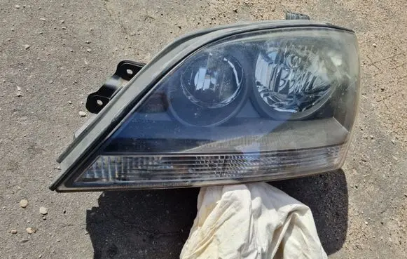 KIA Sorento Headlight/headlamp 921013E0