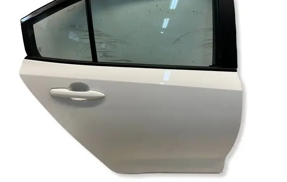 Toyota Corolla E210 E21 Rear door OYT26977