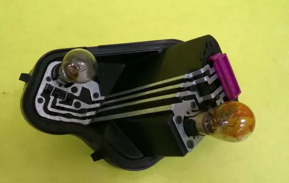 Renault Megane III Tail light bulb cover holder