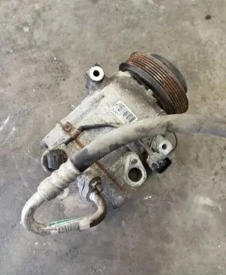 KIA Sportage Air conditioning (A/C) compressor (pump) 977012Y000