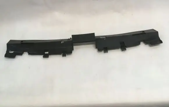 Engine bonnet/hood lock trim molding
