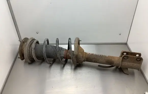 Subaru Forester SG Front shock absorber with coil spring 