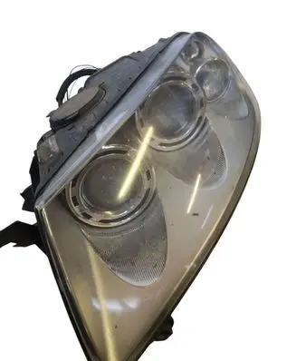 Volkswagen Touareg I Headlight/headlamp 7L6941015CF