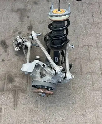 Rear wheel hub spindle/knuckle