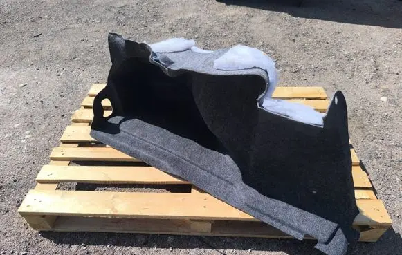 Trunk/boot lower side trim panel