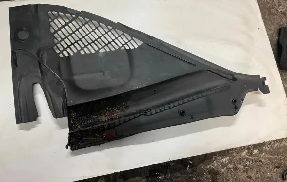 Engine bonnet/hood lock trim molding