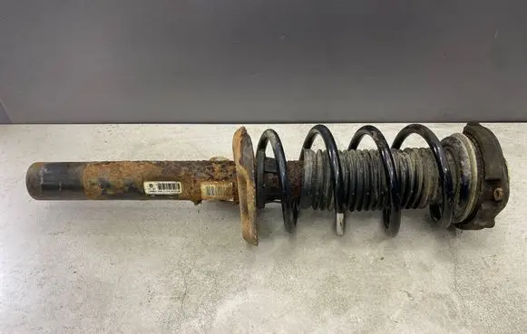 Volkswagen Golf V Front shock absorber with coil spring 1K0412021JL 140808G0176