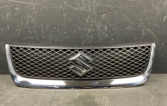 Suzuki Grand Vitara II Front bumper upper radiator grill 7174365J0
