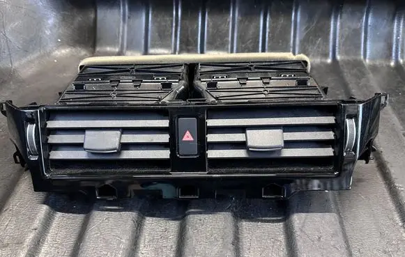 Dash center air vent grill