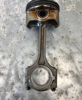 Piston with connecting rod