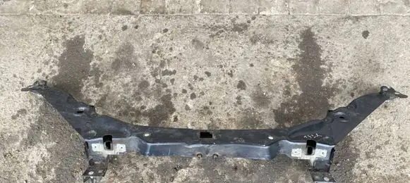 Top upper radiator support slam panel