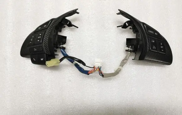 Mazda 3 II Steering wheel buttons/switches 75E504