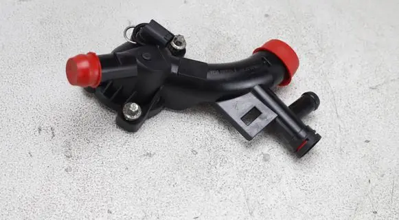 Thermostat/thermostat housing