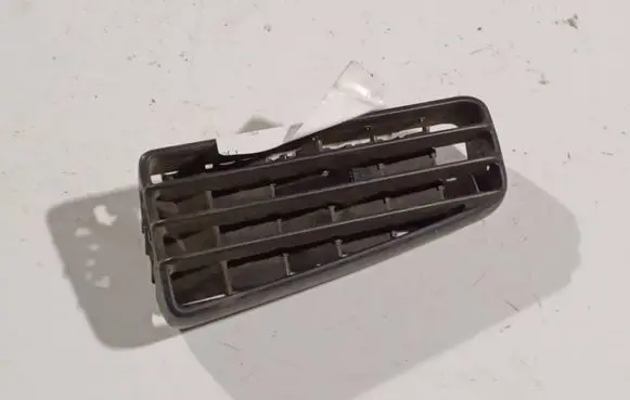Volkswagen Golf III Dash center air vent grill 1H6819707