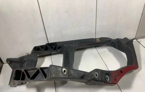 Mitsubishi Colt Headlight/headlamp mounting bracket MN105059