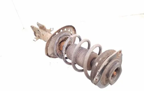 Nissan Pulsar Front shock absorber with coil spring