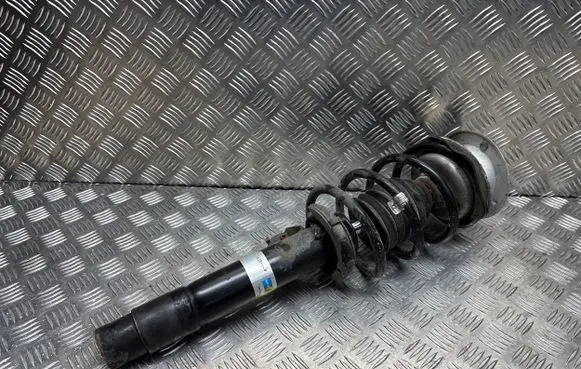 Front shock absorber with coil spring