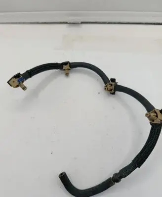 Volkswagen Caddy Fuel return line/hose 04L130235J