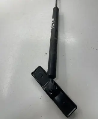 Front door check strap stopper