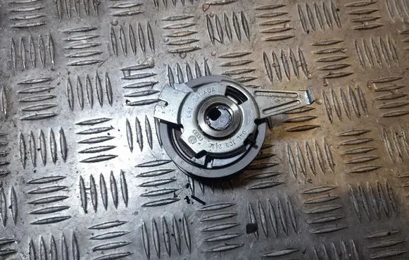 Volkswagen PASSAT CC Belt tensioner pulley 04L109243C