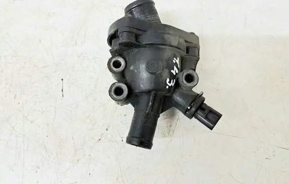 Thermostat/thermostat housing