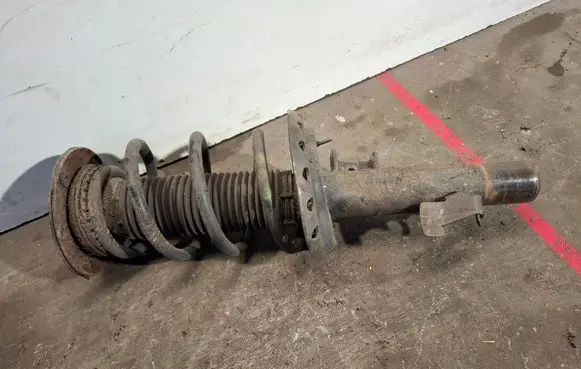 Volvo V60 Front shock absorber with coil spring 31406001