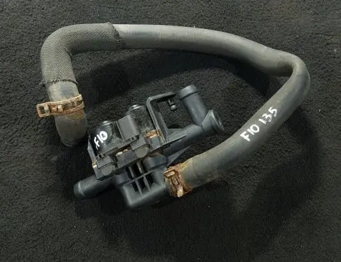 Coolant heater control valve