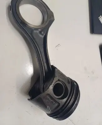 Piston with connecting rod