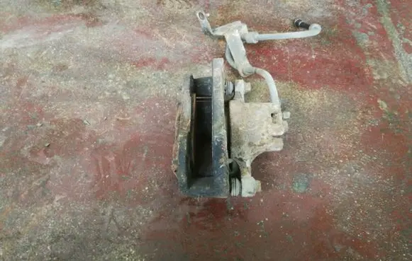 Mitsubishi Lancer X Front brake caliper