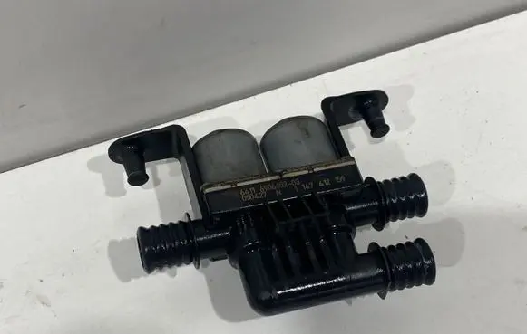 Coolant heater control valve