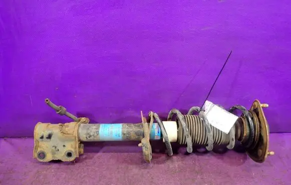Mitsubishi Colt Front shock absorber with coil spring 313189