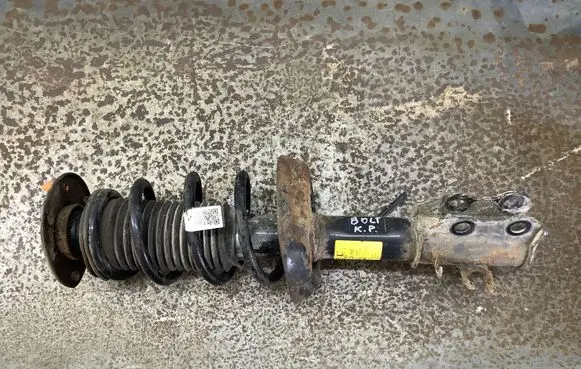 Front shock absorber with coil spring
