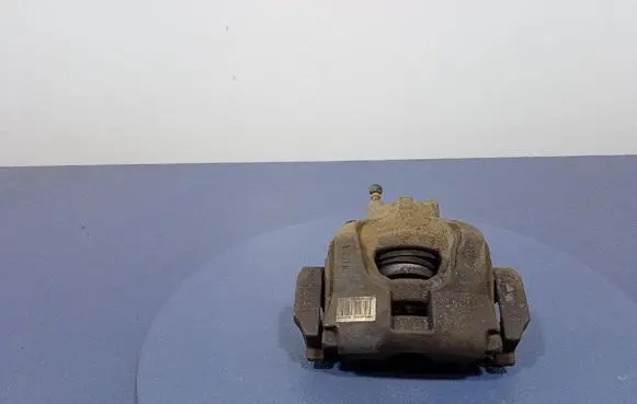 Ford Mondeo MK I Front brake caliper DG9C-2010-EE