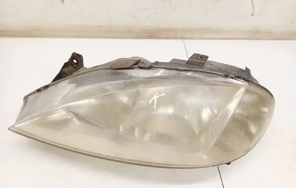 Renault Megane I Headlight/headlamp 7700427874D