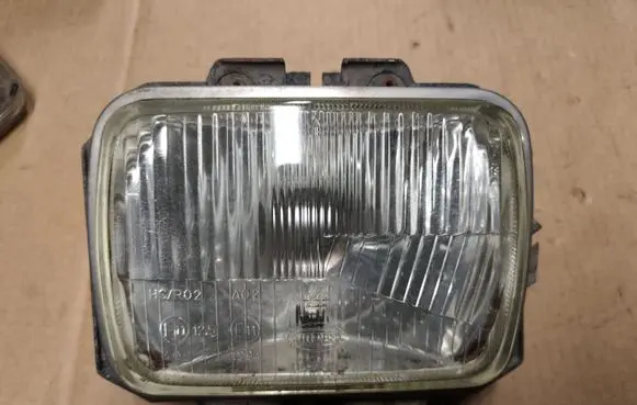 Jeep Cherokee XJ Headlight/headlamp 55055299AE