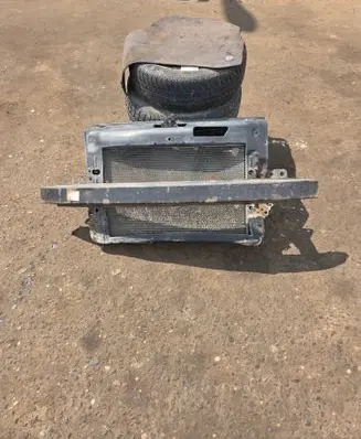 Radiator support slam panel
