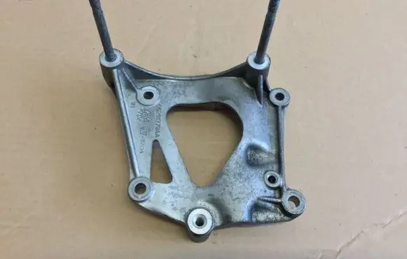 Chrysler Pacifica A/C compressor mount bracket 05281379AA