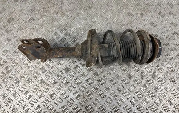Front shock absorber with coil spring