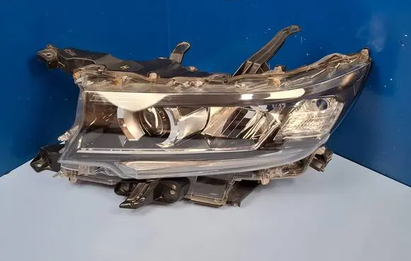 Toyota Land Cruiser (J150) Headlight/headlamp 8118560N20