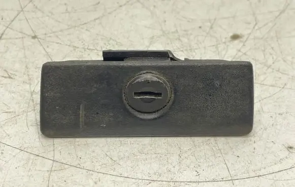 Glove box handle
