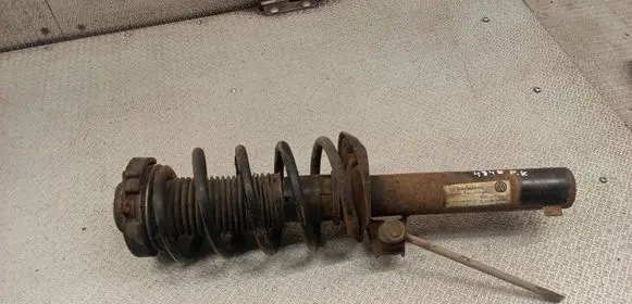 Volkswagen Touran I Front shock absorber with coil spring 1K0400053CJ