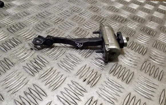 Front door check strap stopper