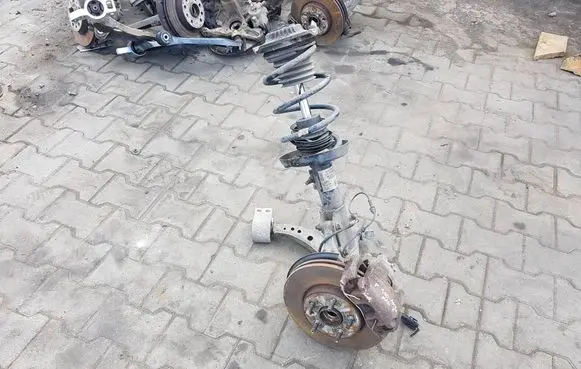 Front wheel hub spindle knuckle
