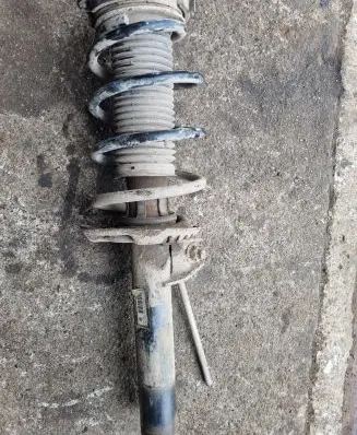 Volkswagen Golf V Front shock absorber with coil spring 1K0413031AD 24A4H3