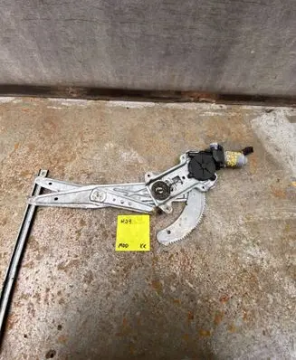 Nissan Micra Front door window regulator with motor 4006605
