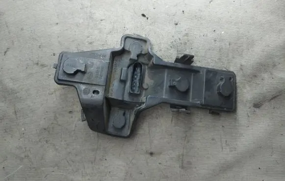 Tail light bulb cover holder